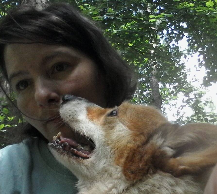 Picture of Liz with a Pembroke Welsh Corgi